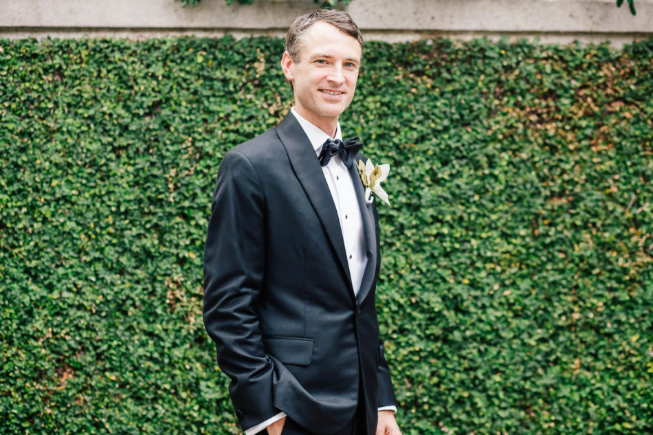Groom stands by ivy covered wall, Grand Bohemian, Charleston, South Carolina Kate Timbers Photography. http://katetimbers.com #katetimbersphotography // Charleston Photography // Inspiration