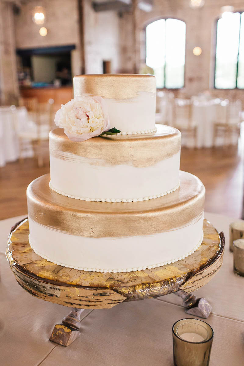 Cake has painted gold on each layer, The Cedar Room, Charleston, South Carolina Kate Timbers Photography. http://katetimbers.com #katetimbersphotography // Charleston Photography // Inspiration