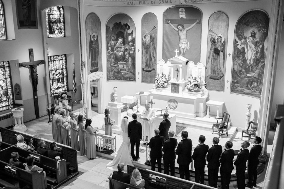 Bride and groom stand at altar, St Mary of the Annunciation, Charleston, South Carolina Kate Timbers Photography. http://katetimbers.com #katetimbersphotography // Charleston Photography // Inspiration
