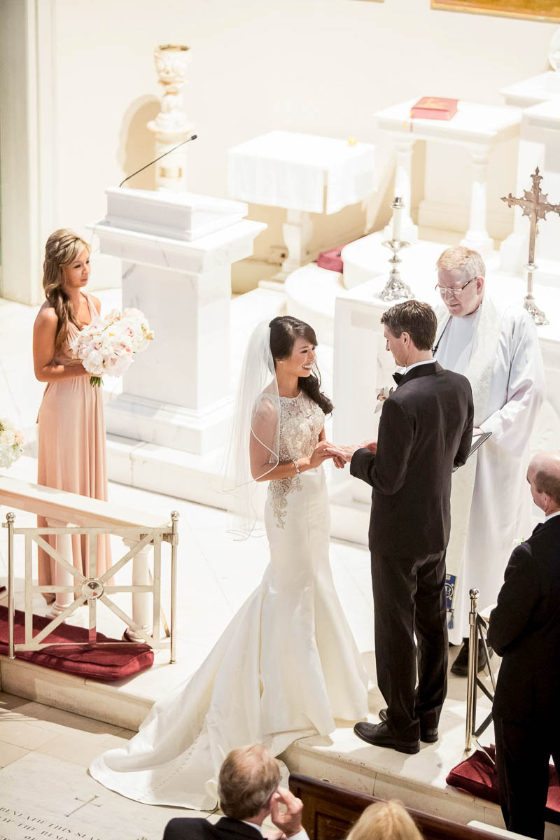 Bride and groom exchange vows, St Mary of the Annunciation, Charleston, South Carolina Kate Timbers Photography. http://katetimbers.com #katetimbersphotography // Charleston Photography // Inspiration