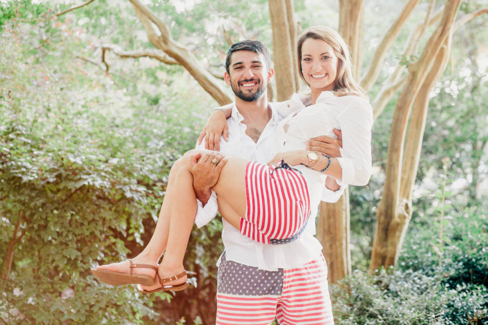 Engaged couple doing a goofy pose with Chubbies American Flag shorts, Hampton Park, Charleston, South Carolina Kate Timbers Photography. http://katetimbers.com #katetimbersphotography // Charleston Photography // Inspiration