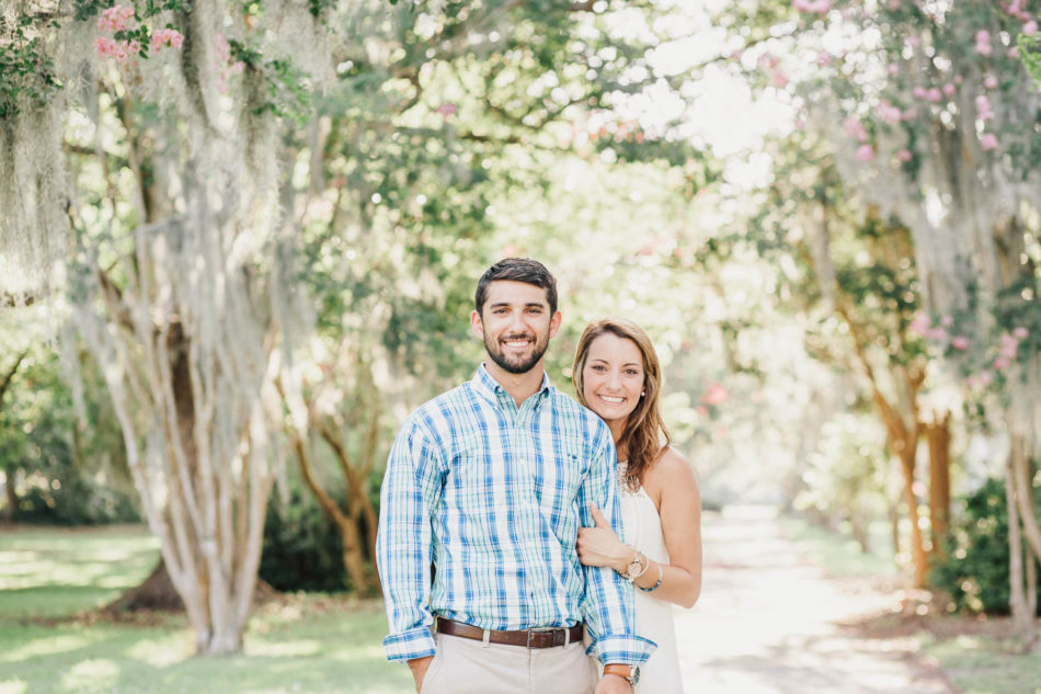 Engaged couple stands in clearing with spanish moss covered trees all around, Hampton Park, Charleston, South Carolina Kate Timbers Photography. http://katetimbers.com #katetimbersphotography // Charleston Photography // Inspiration