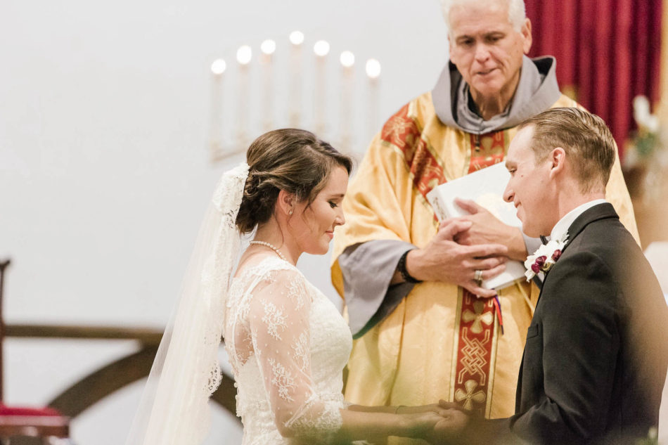 Bride and groom exchange vows, St. Luke's Church, Charleston, South Carolina Kate Timbers Photography. http://katetimbers.com #katetimbersphotography // Charleston Photography // Inspiration