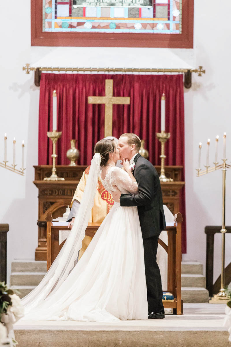 Bride and groom kiss, St. Luke's Church, Charleston, South Carolina Kate Timbers Photography. http://katetimbers.com #katetimbersphotography // Charleston Photography // Inspiration