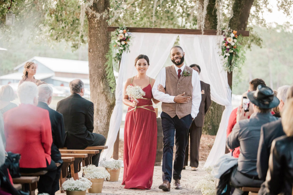 Bridesmaid and groomsman walk up the aisle, Boals Farm, Charleston, South Carolina Kate Timbers Photography. http://katetimbers.com #katetimbersphotography // Charleston Photography // Inspiration