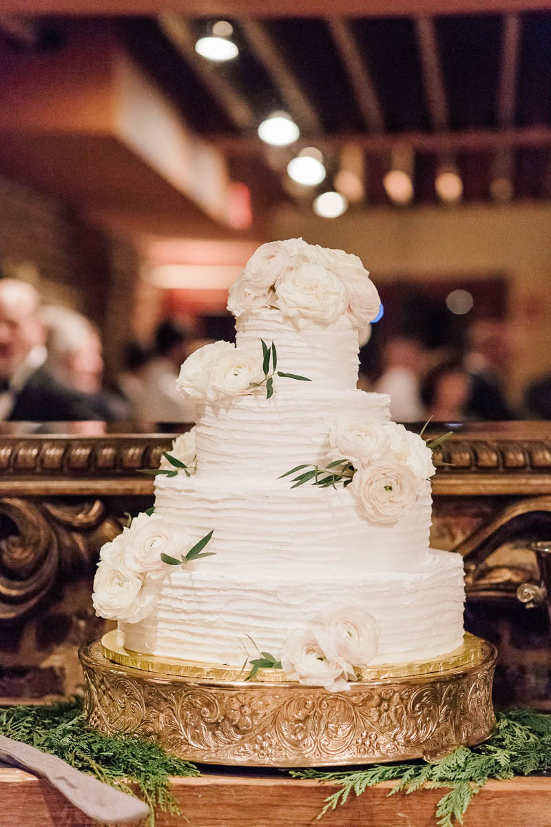 Cake is accented with flowers, No. 5 Faber, Charleston, South Carolina Kate Timbers Photography. http://katetimbers.com #katetimbersphotography // Charleston Photography // Inspiration