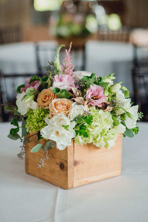 Flowers sit in a crate for centerpieces, Creek Club at I'on, Charleston, South Carolina. Kate Timbers Photography. http://katetimbers.com