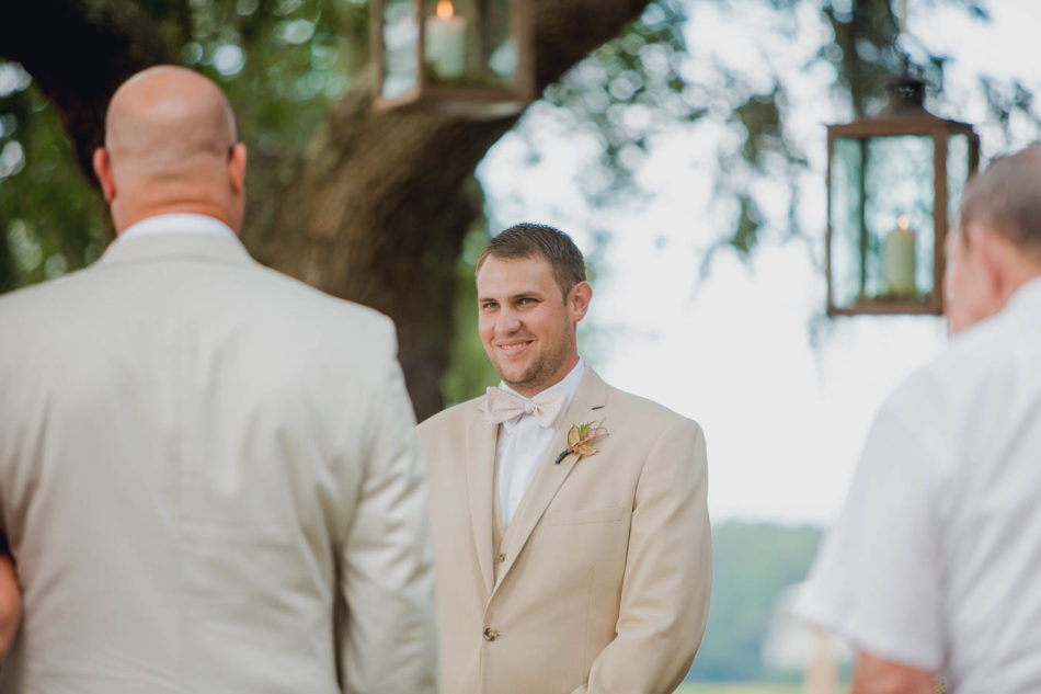 Groom sees bride for first time, Creek Club at I'on, Charleston, South Carolina. Kate Timbers Photography. http://katetimbers.com