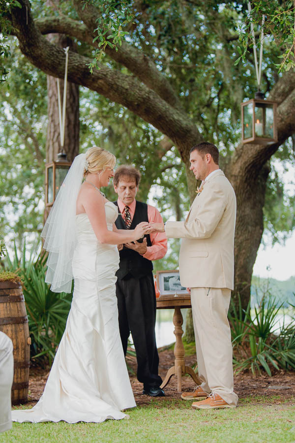 Bride and groom exchange vows, Creek Club at I'on, Charleston, South Carolina. Kate Timbers Photography. http://katetimbers.com