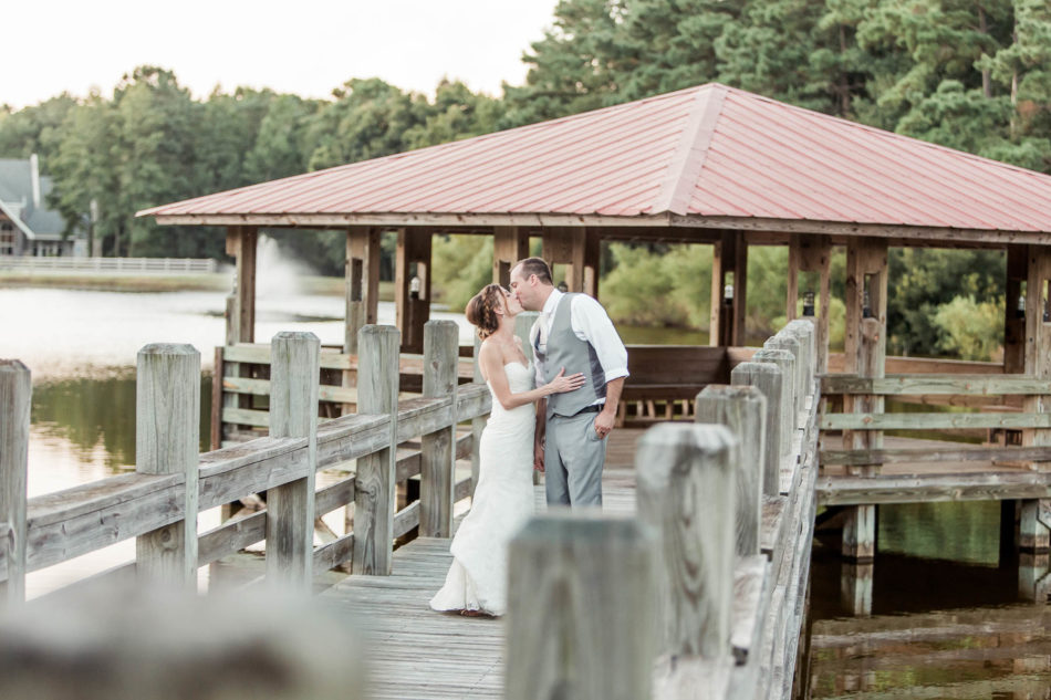 Bride and groom walk down the dock, Pepper Plantation, Awendaw, South Carolina. Kate Timbers Photography. http://katetimbers.com