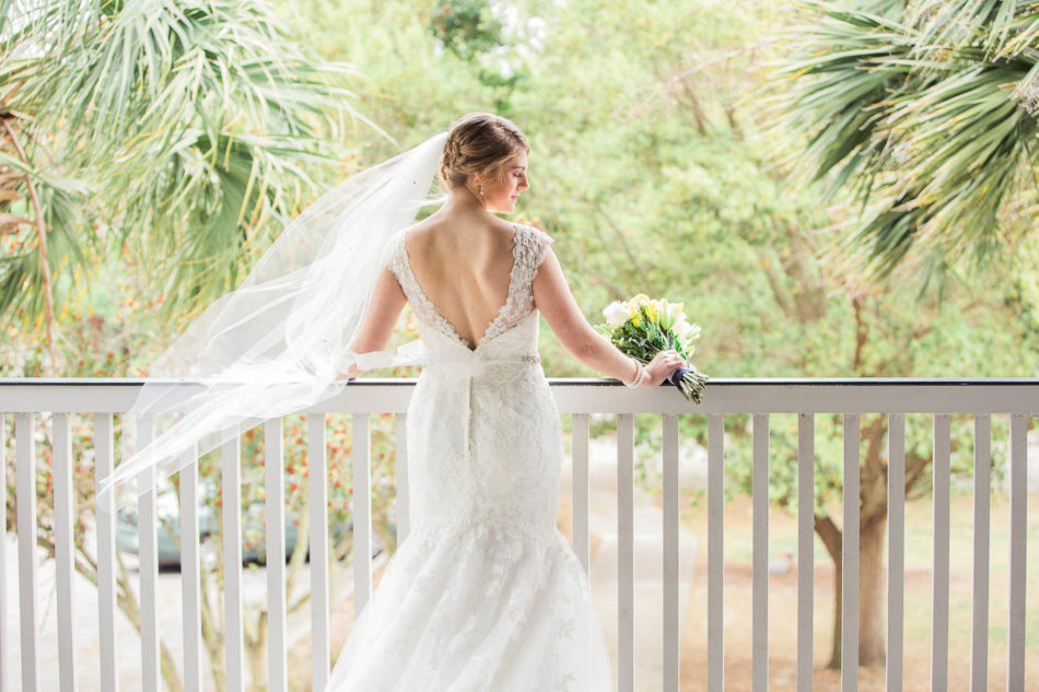 Bride holds bouquet at Alhambra Hall, Mount Pleasant, South Carolina. Kate Timbers Photography. http://katetimbers.com
