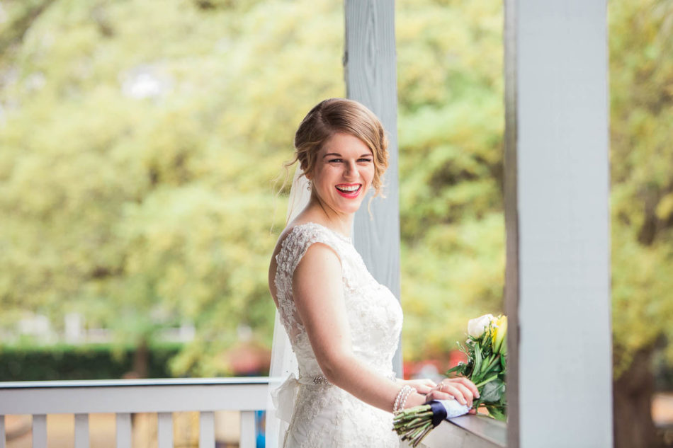 Bride holds bouquet at Alhambra Hall, Mount Pleasant, South Carolina. Kate Timbers Photography. http://katetimbers.com