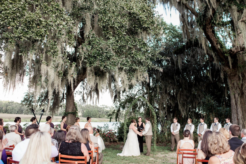 Bride and groom exchange vows, Magnolia Plantation. Kate Timbers Photography. http://katetimbers.com