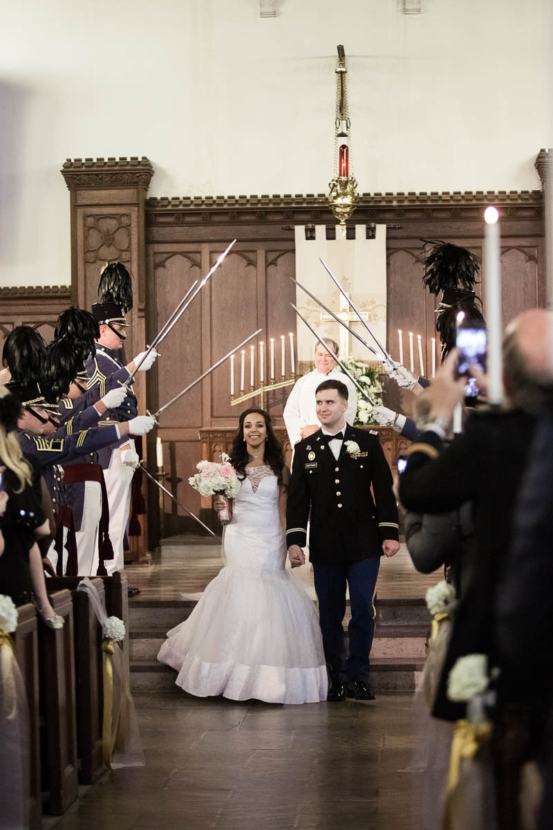 Bride and groom have sword exit, Citadel, Summerall Chapel, Charleston, South Carolina. Kate Timbers Photography. http://katetimbers.com