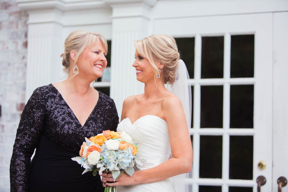 Bride smiles with mother, Dunes West Golf and River Club, Mt Pleasant, South Carolina. Kate Timbers Photography. http://katetimbers.com