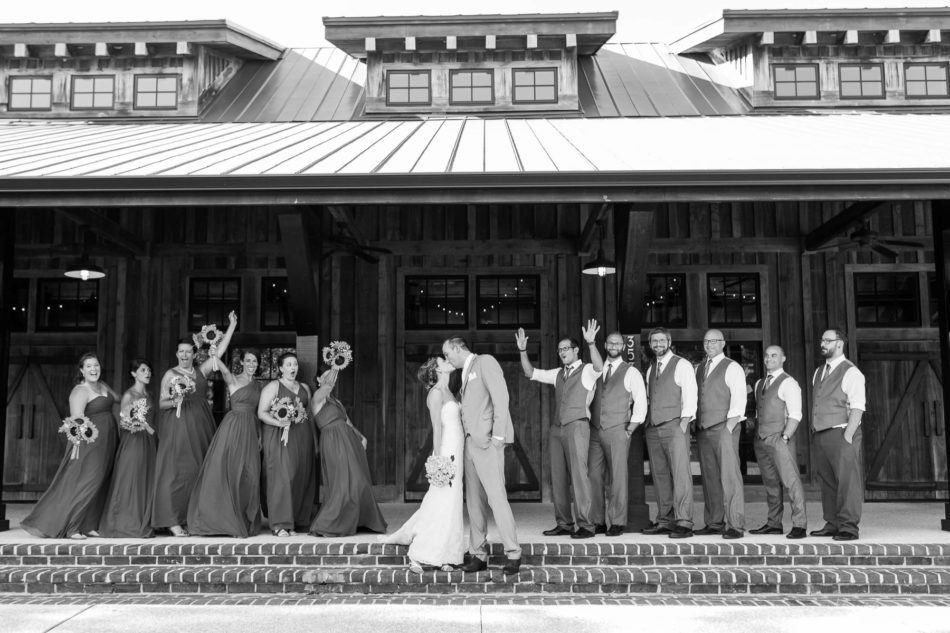 Wedding party poses in front of barn, Pepper Plantation, Awendaw, South Carolina. Kate Timbers Photography. http://katetimbers.com