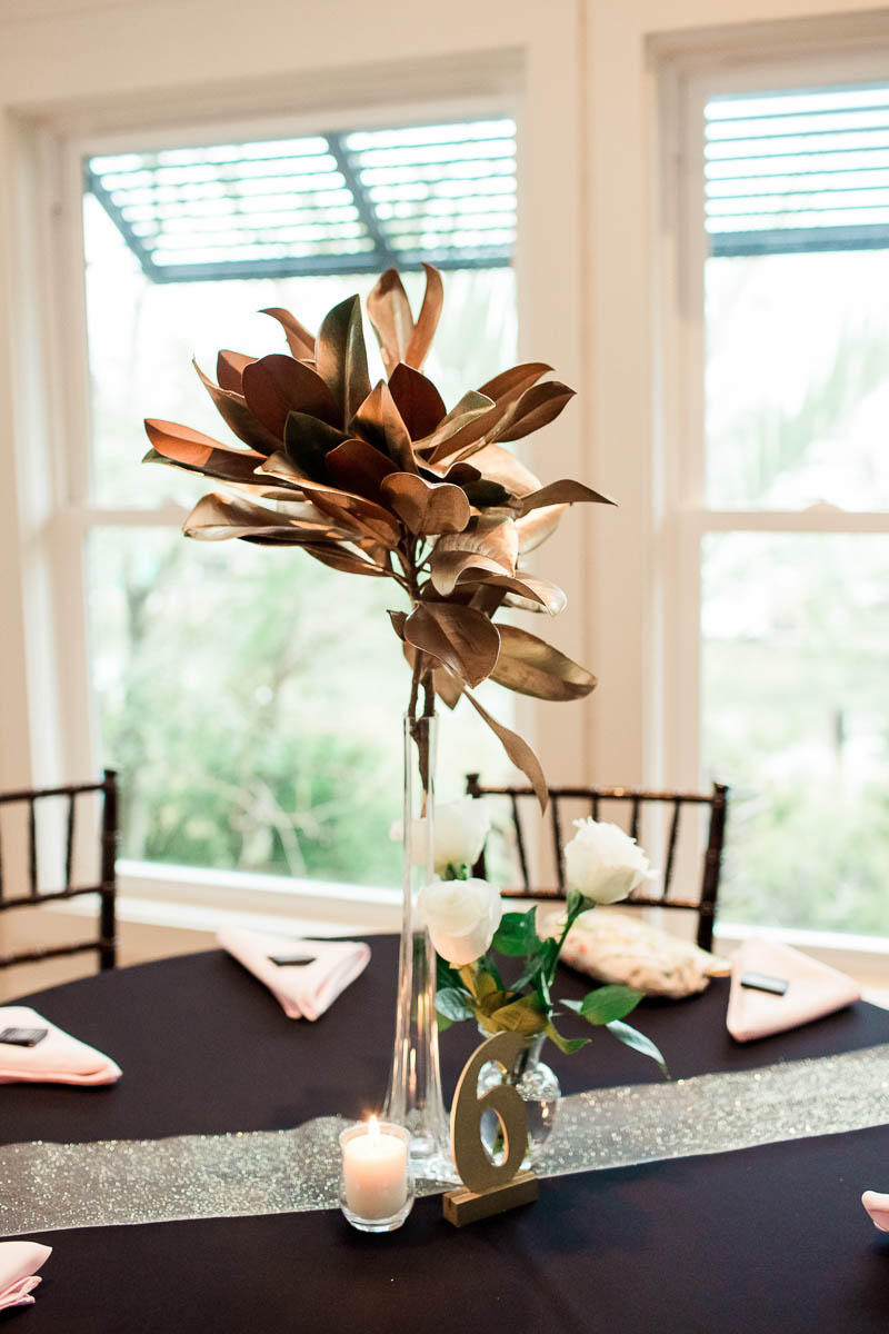 Gold magnolia leaves are in the centerpieces, Cottage on the Creek, Shem Creek, Charleston, South Carolina. Kate Timbers Photography. http://katetimbers.com