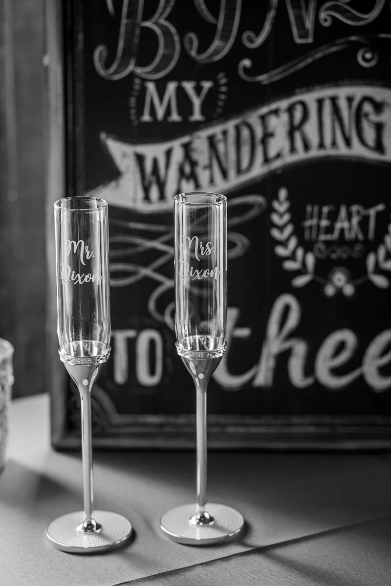 Champagne flutes sit by cake, Magnolia Plantation. Kate Timbers Photography. http://katetimbers.com