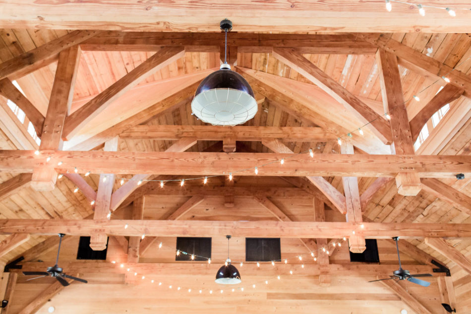 Lights are strung on beams, Pepper Plantation, Awendaw, South Carolina. Kate Timbers Photography. http://katetimbers.com