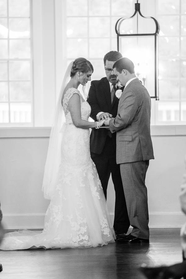 Bride and groom exchange vows, Alhambra Hall, Charleston, South Carolina. Kate Timbers Photography. http://katetimbers.com