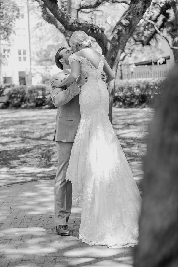 Bride and groom stand together, College of Charleston Cistern, South Carolina. Kate Timbers Photography. http://katetimbers.com