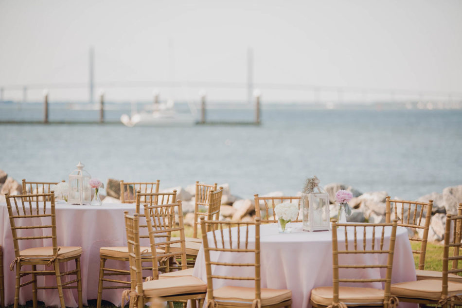 Flowers and spanish moss are placed in vintage glassware, James Island Yacht Club, Charleston, South Carolina. Kate Timbers Photography. http://katetimbers.com