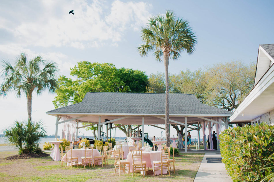 Reception is set next to ocean, James Island Yacht Club, Charleston, South Carolina. Kate Timbers Photography. http://katetimbers.com