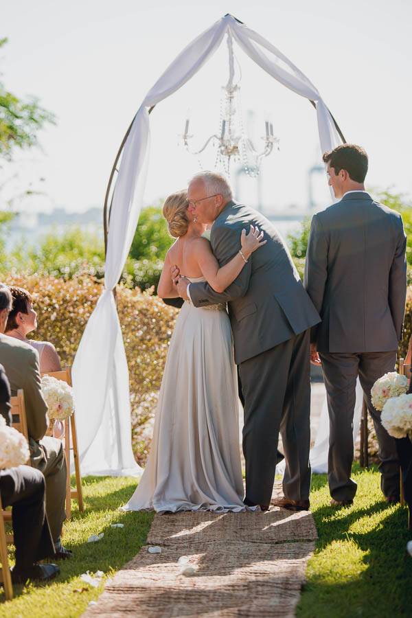 Father gives bride away, Harborside East, Mt Pleasant, South Carolina. Kate Timbers Photography. http://katetimbers.com