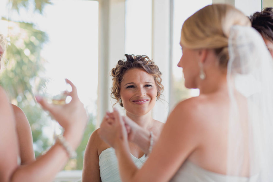 Bridesmaid smiles, Cottages on Charleston Harbor, Mt Pleasant, South Carolina. Kate Timbers Photography. http://katetimbers.com
