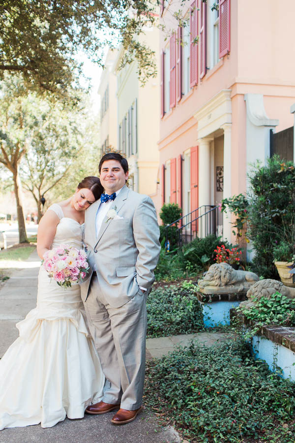 Bride and groom stand by "Rainbow Row" of I'on, Creek Club at I'on, Charleston, South Carolina. Kate Timbers Photography. http://katetimbers.com