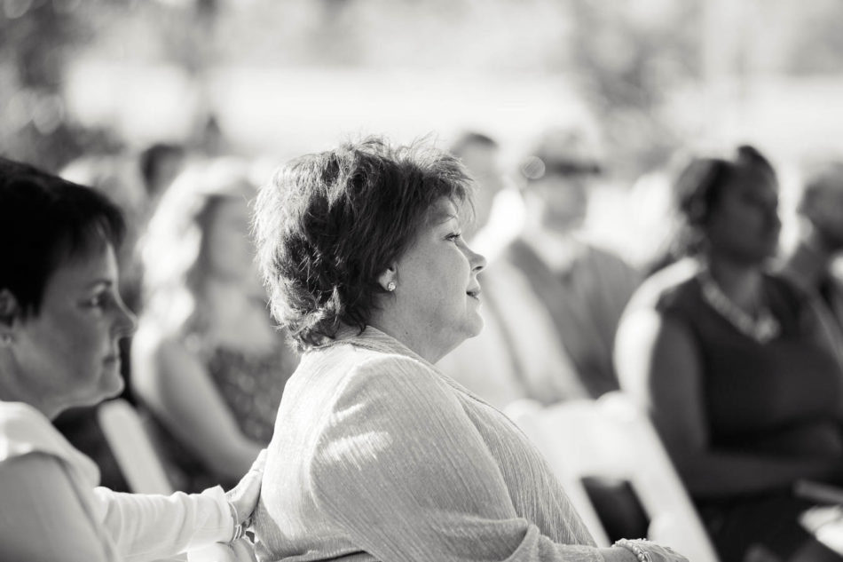 Guests watch ceremony, Creek Club at I'on, Charleston, South Carolina. Kate Timbers Photography. http://katetimbers.com