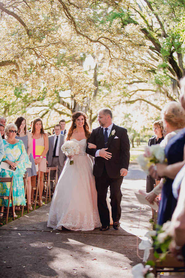 Father walks bride down the aisle, Brookgreen Gardens, Murrells Inlet, South Carolina. Kate Timbers Photography. http://katetimbers.com