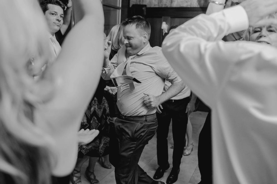 Guests dance at reception, Harborside East, Mt Pleasant, South Carolina. Kate Timbers Photography. http://katetimbers.com