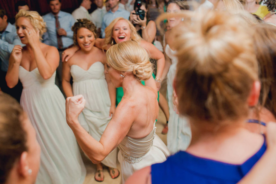 Guests dance at reception, Harborside East, Mt Pleasant, South Carolina. Kate Timbers Photography. http://katetimbers.com