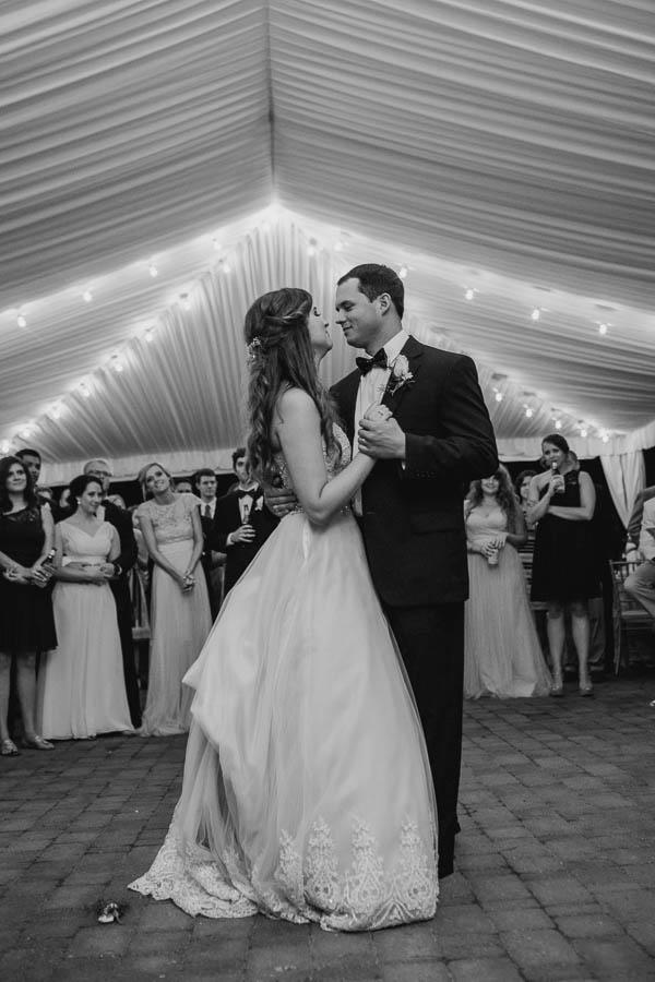 Bride and groom have first dance, Brookgreen Gardens, Murrells Inlet, South Carolina. Kate Timbers Photography. http://katetimbers.com
