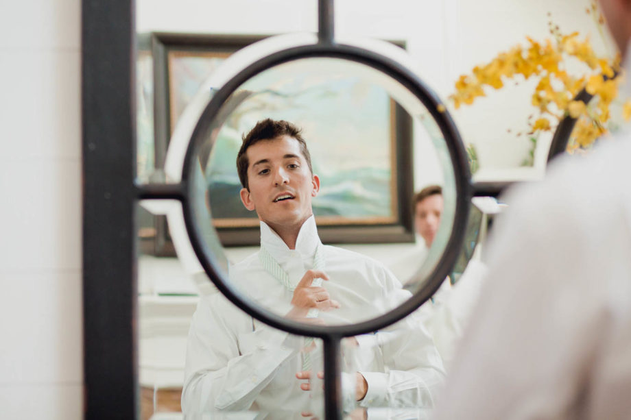 Groom gets ready, Cottages on Charleston Harbor, Mt Pleasant, South Carolina. Kate Timbers Photography. http://katetimbers.com