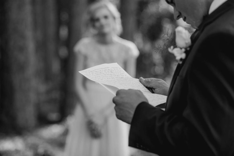Groom reads bride's note, Brookgreen Gardens, Murrells Inlet, South Carolina. Kate Timbers Photography. http://katetimbers.com