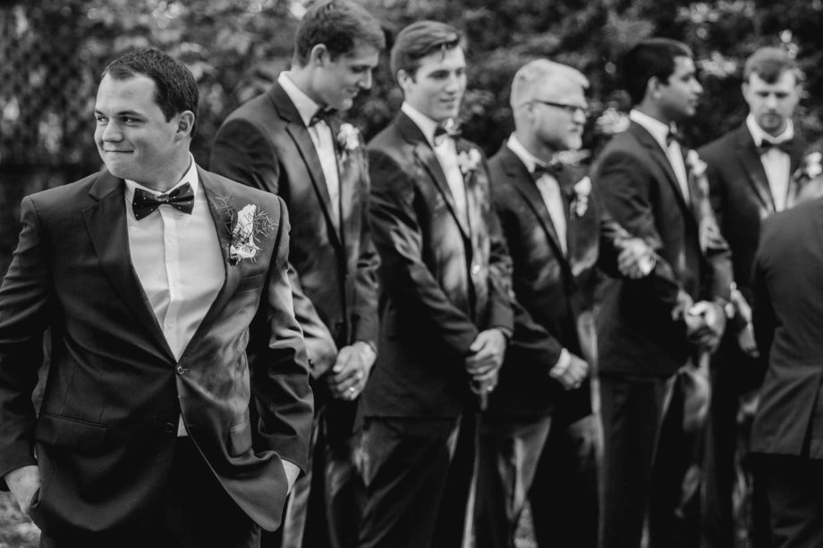 Groom stands at altar with anticipation, Brookgreen Gardens, Murrells Inlet, South Carolina. Kate Timbers Photography. http://katetimbers.com