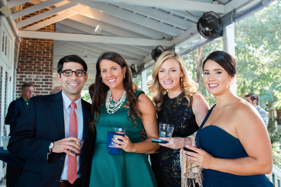 Guests mingle at reception, Creek Club at I'on, Charleston, South Carolina. Kate Timbers Photography. http://katetimbers.com