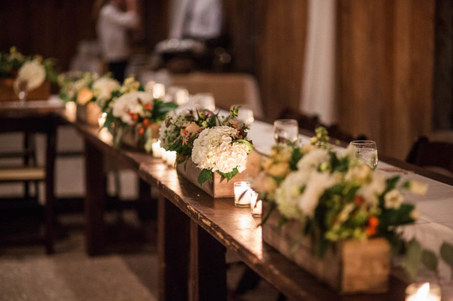 Flowers sit in wooden crates at reception, Boone Hall Plantation, Charleston, South Carolina. Kate Timbers Photography. http://katetimbers.com