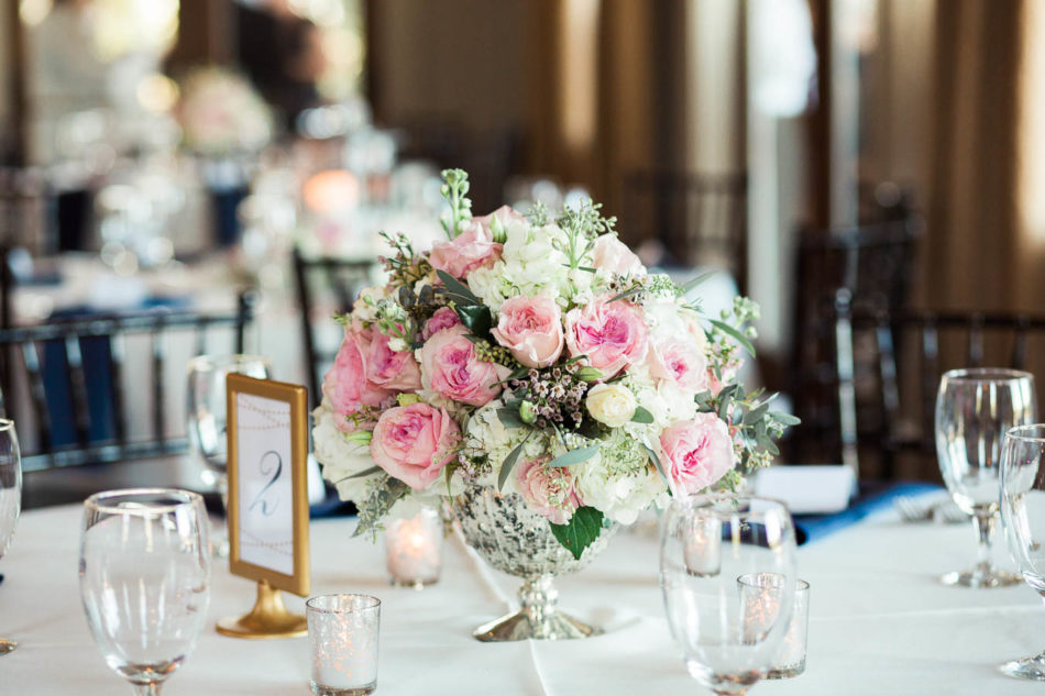 Flower centerpieces were arranged by Wildflower Inc, Creek Club at I'on, Charleston, South Carolina. Kate Timbers Photography. http://katetimbers.com