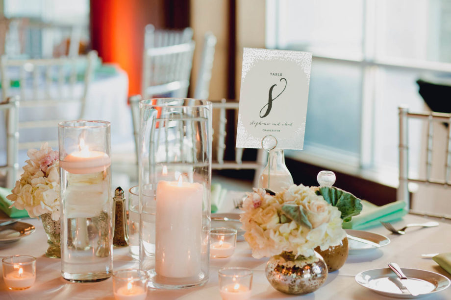 Tables are set up for reception, Harborside East, Mt Pleasant, South Carolina. Kate Timbers Photography. http://katetimbers.com