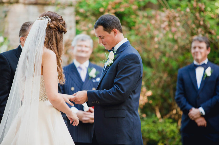 Bride and groom exchange rings, Brookgreen Gardens, Murrells Inlet, South Carolina. Kate Timbers Photography. http://katetimbers.com