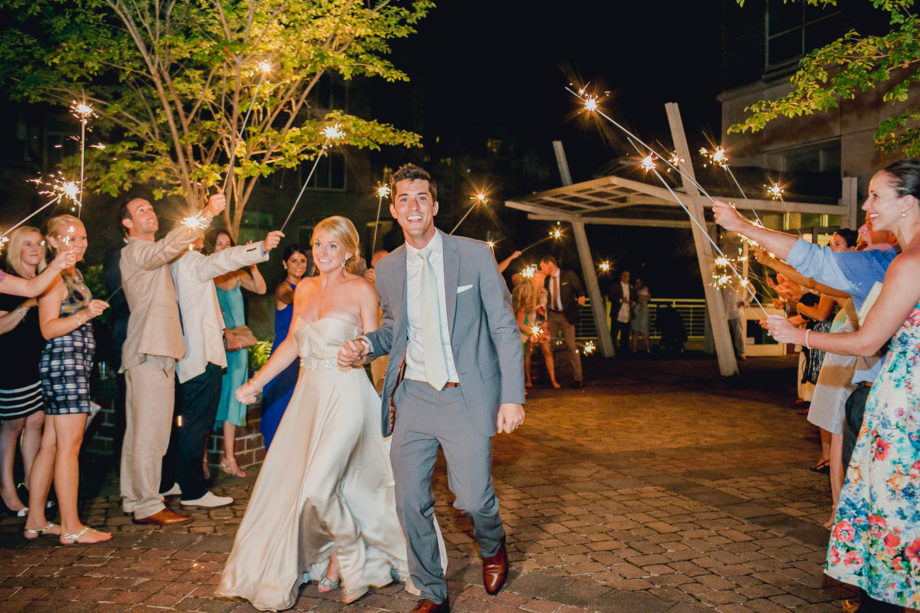 Bride and groom have a sparkler exit, Harborside East, Mt Pleasant, South Carolina. Kate Timbers Photography. http://katetimbers.com
