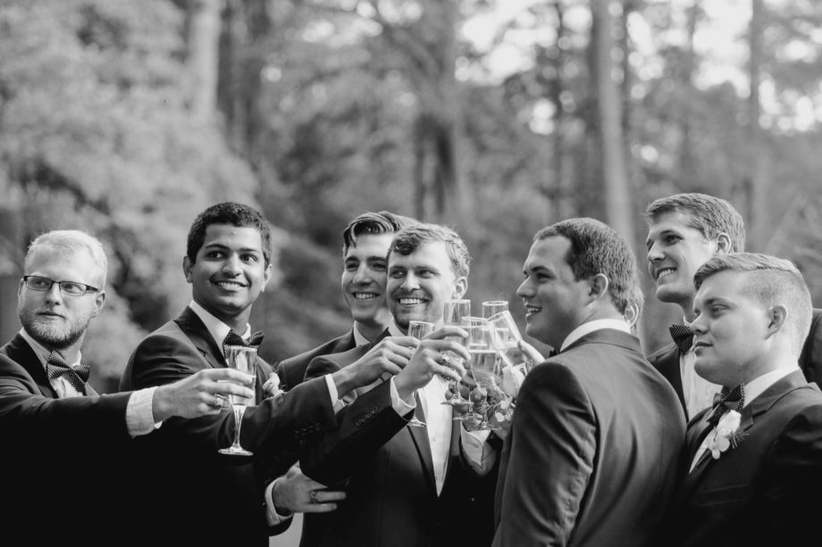 Wedding party raises glasses after ceremony, Brookgreen Gardens, Murrells Inlet, South Carolina. Kate Timbers Photography. http://katetimbers.com