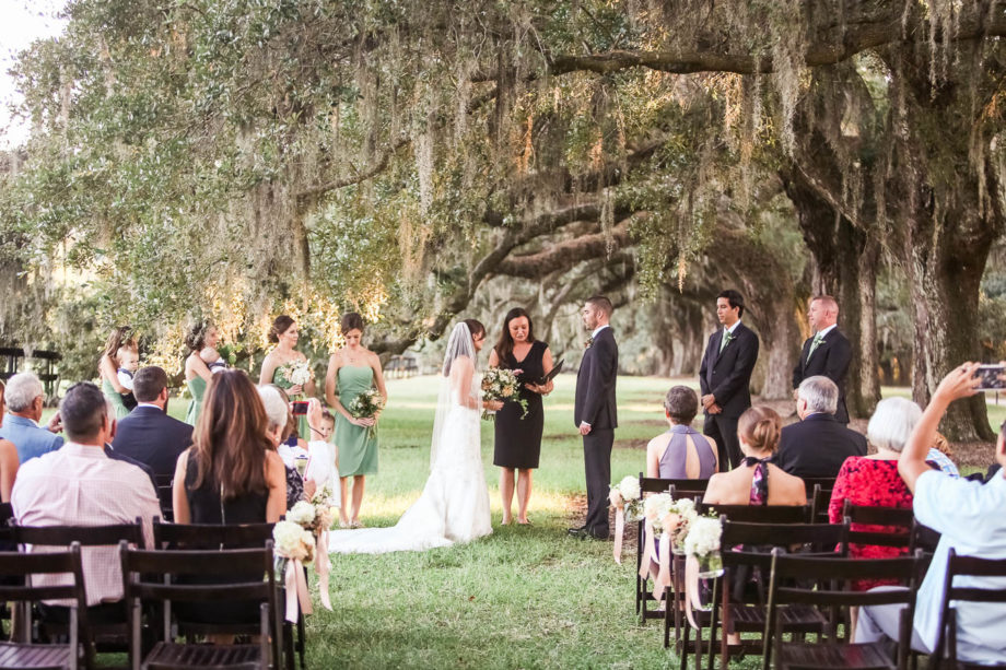 Bride and groom exchange vows, Boone Hall Plantation, Charleston, South Carolina. Kate Timbers Photography. http://katetimbers.com