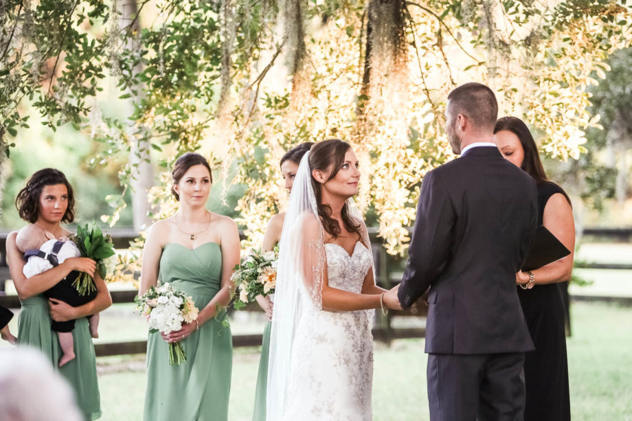 Bride and groom exchange vows, Boone Hall Plantation, Charleston, South Carolina. Kate Timbers Photography. http://katetimbers.com