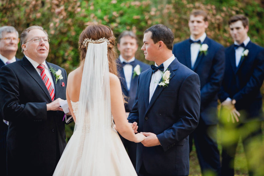 Bride and groom exchange vows, Brookgreen Gardens, Murrells Inlet, South Carolina. Kate Timbers Photography. http://katetimbers.com