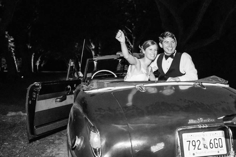 Vintage car is bride and groom's getaway car, Oakland Plantation, Mt Pleasant, South Carolina Kate Timbers Photography. http://katetimbers.com #katetimbersphotography // Charleston Photography // Inspiration