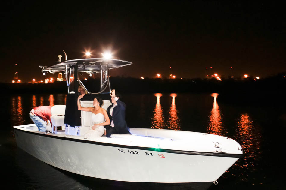 Bride and groom have boat exit, I'ON Creek Club, Mt Pleasant, South Carolina Kate Timbers Photography. http://katetimbers.com #katetimbersphotography // Charleston Photography // Inspiration